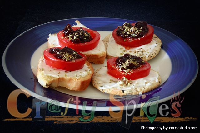 Appetizer - Cream Cheese, tomato, blueberry & oregano in toast & crackers