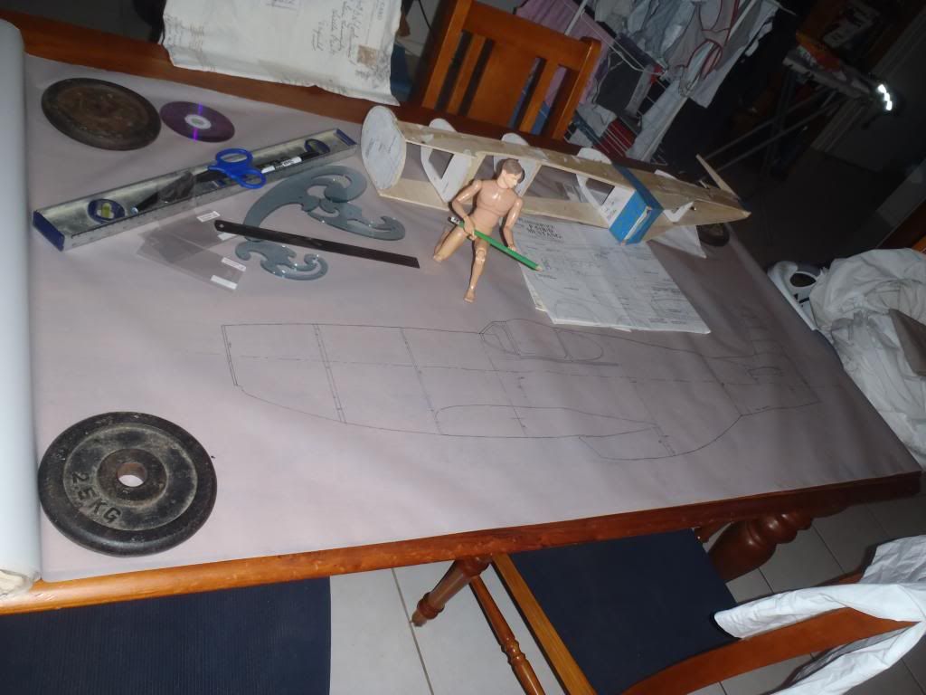 plans traced onto tracing paper, the future pilot is overseeing the task