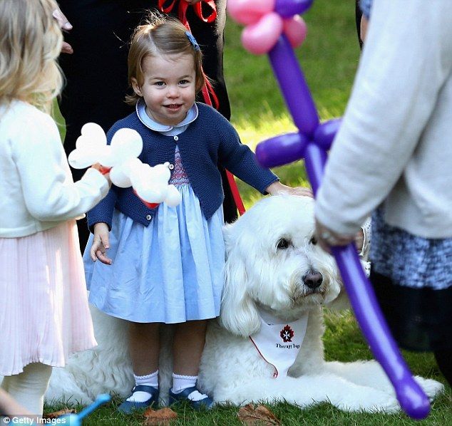  photo 38EDE08700000578-3814554-Princess_Charlotte_also_spent_time_playing_with_a_dog_named_Moos-a-15_1475181722791_zpss7eqbjqr.jpg