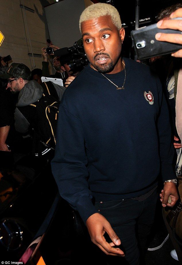  photo 3D44D86800000578-4229562-Simple_look_Kanye_was_dressed_comfortably_in_a_T_shirt_layered_u-a-3_1487216898205_zpsiy4uk8rr.jpg