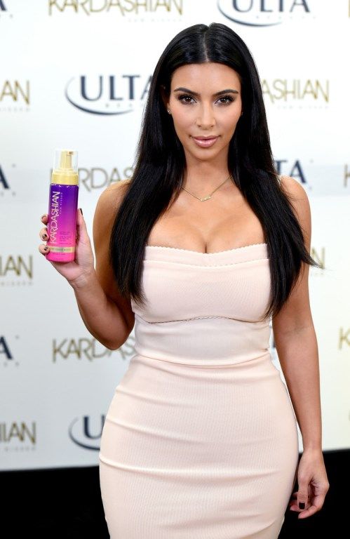  photo KimKardashian-20140806-KardashianSunKissedPromoEvent6_zpsae76f5bb.jpg