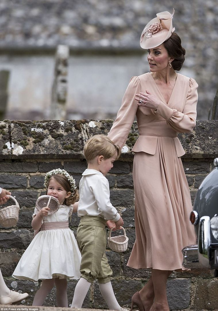  photo 4093A58B00000578-4524842-Princess_Charlotte_held_onto_her_mother_s_hand_as_the_trio_left_-a-14_1495301740164_zpssgego0df.jpg