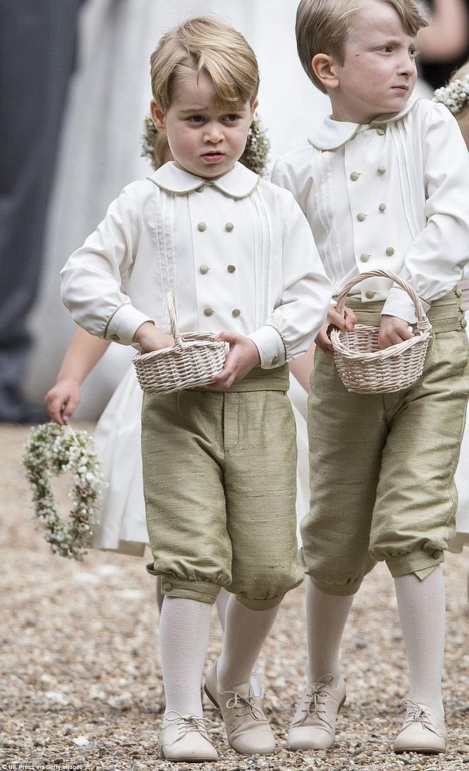  photo 4093A5DF00000578-4525752-Prince_George_was_cherubic_in_his_little_page_boy_outfit_as_he_g-a-35_1495322881268_zpswoq7ausk.jpg