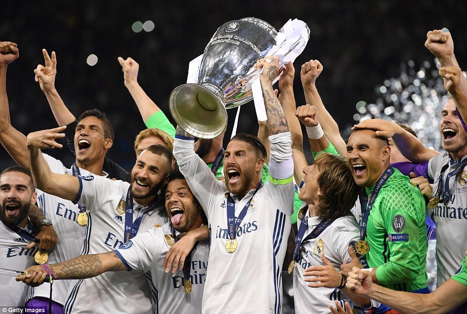  photo 41125C3B00000578-4569632-Real_Madrid_captain_Sergio_Ramos_lifts_the_Champions_League_trop-a-12_1496530617025_zpshipgujrs.jpg