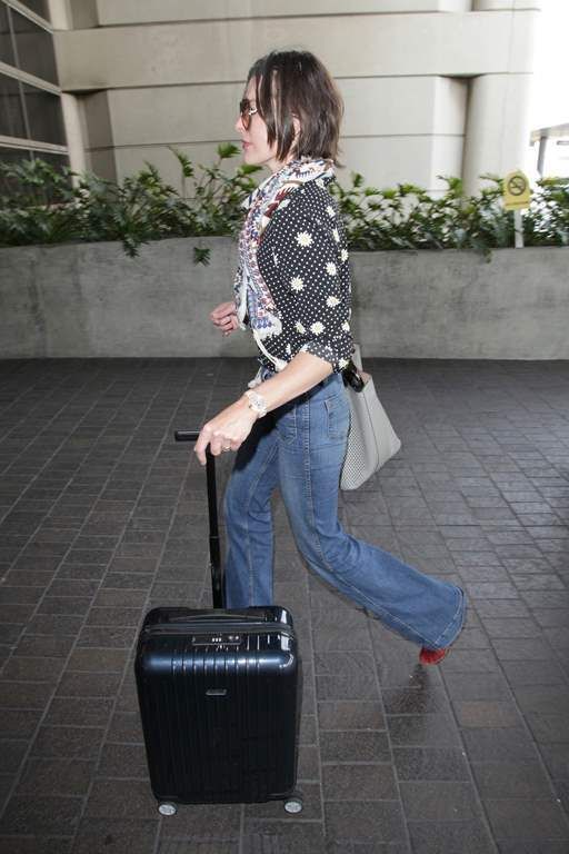  photo Milla Jovovich Is seen departing LAX May 14-2016 025_zpsyvzliexx.jpg
