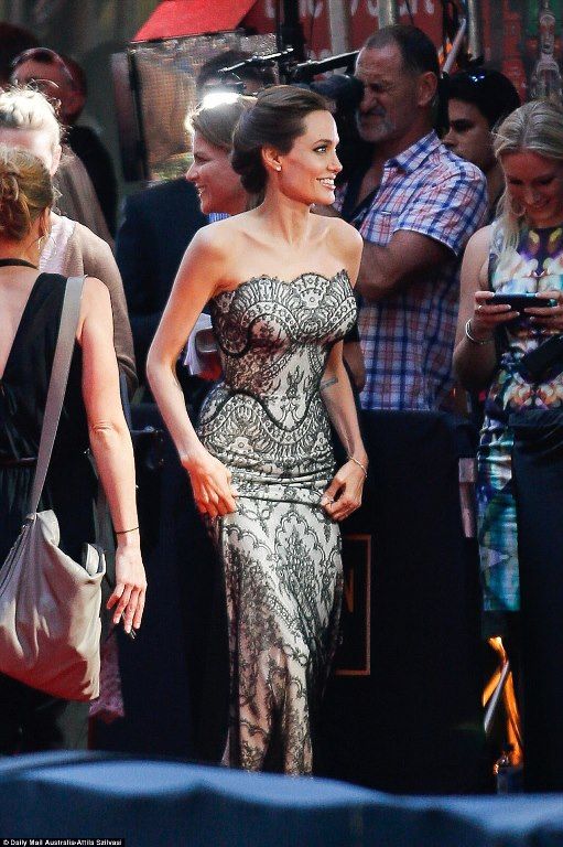 photo 1416217904366_wps_15_Angelina_Jolie_and_Brad_P_zps5d80c1bd.jpg
