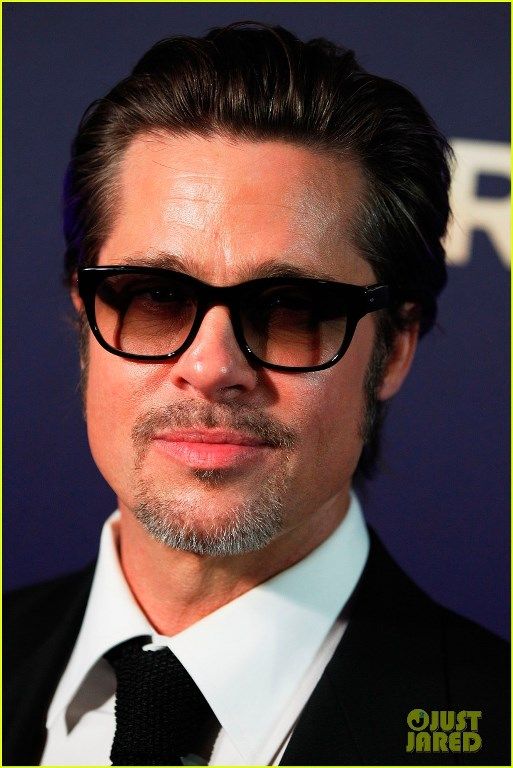 photo angelina-jolie-gets-support-from-hubby-brad-pitt-at-unbroken-05_zps94d4ac3b.jpg