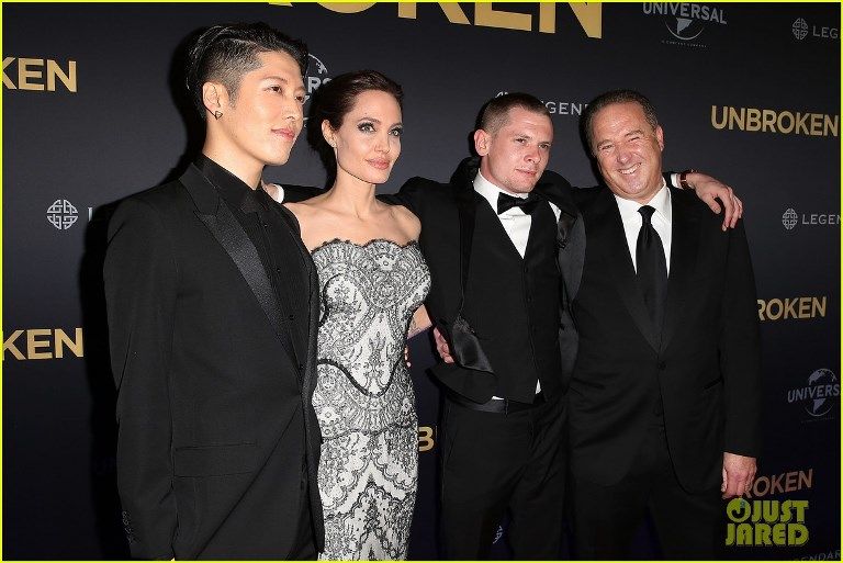 photo angelina-jolie-gets-support-from-hubby-brad-pitt-at-unbroken-06_zpsc6636419.jpg