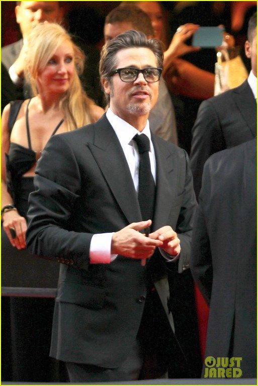 photo angelina-jolie-gets-support-from-hubby-brad-pitt-at-unbroken-10_zps90334d30.jpg