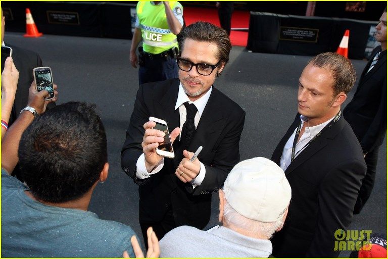 photo angelina-jolie-gets-support-from-hubby-brad-pitt-at-unbroken-17_zpsd40f0bd6.jpg